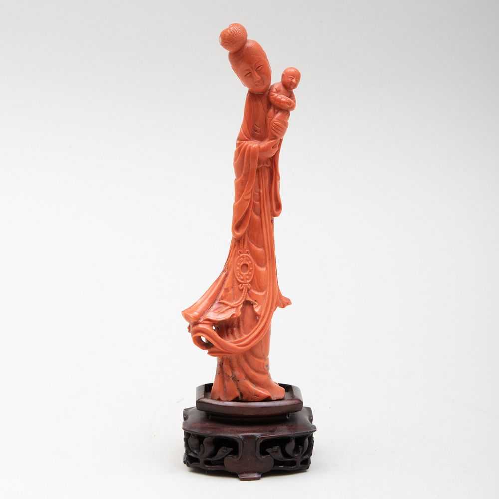 Appraisal: Chinese Coral Figure of Guanyin With wood stand in high