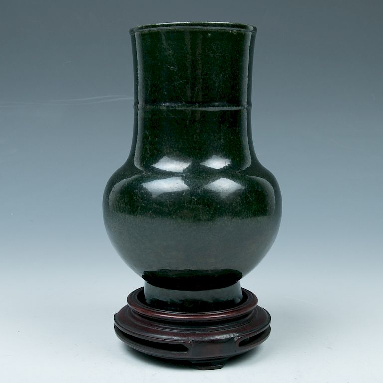 Appraisal: GREEN GLAZED VASE WITH STAND The vase of the globular