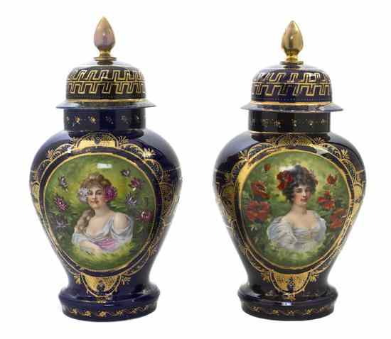 Appraisal: A Pair of Royal Vienna Porcelain Covered Urns each of