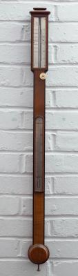 Appraisal: A Georgian style mahogany stick barometer th Century enclosed silvered