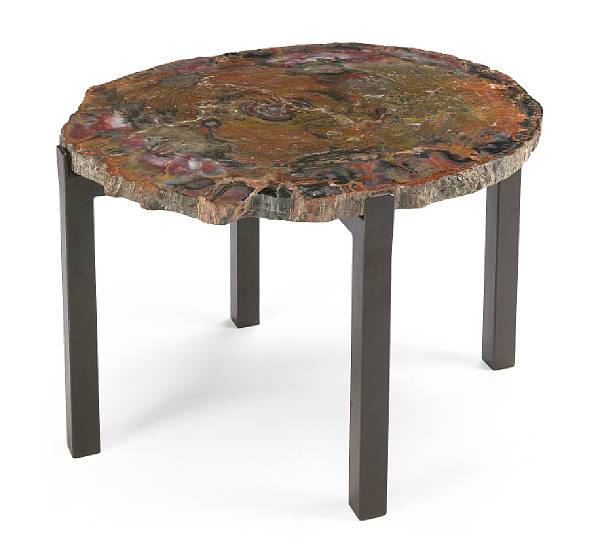 Appraisal: A Tony Duquette Studios petrified wood and wrought-metal table height