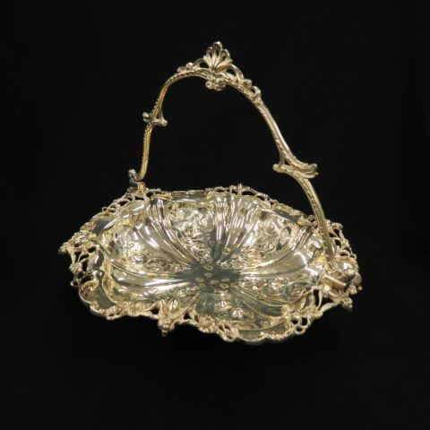 Appraisal: English Silverplate Basket swing handle th century very ornate