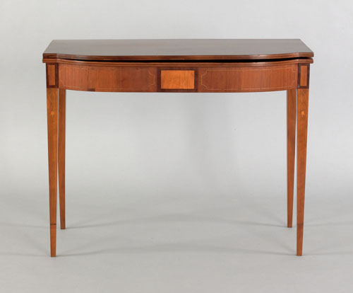 Appraisal: Federal cherry and mahogany bowfront card table ca with line