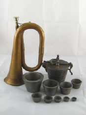 Appraisal: A brass bugle together with a large set of ten