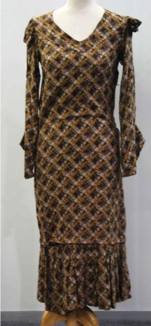 Appraisal: s daydress in printed stylised checked rayon crepe in tones