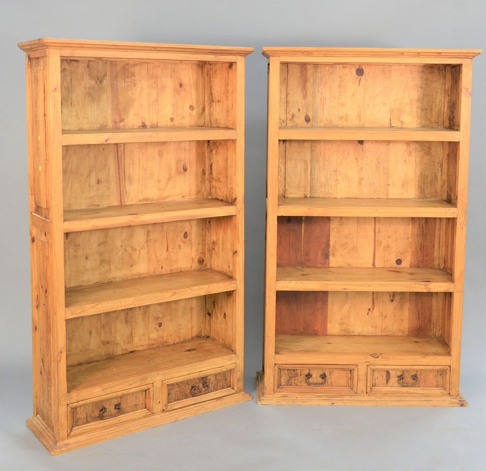 Appraisal: Pair of contemporary pine bookcases each with two drawers ht