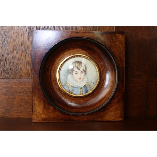 Appraisal: French portrait miniature of a young boy approx cm Sq