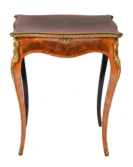 Appraisal: A TH CENTURY FRENCH WALNUT SERPENTINE DRESSING TABLE the crossbanded