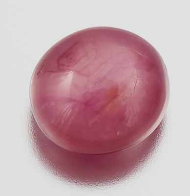 Appraisal: An Unmounted Natural Star Ruby Oval cabochon cut weighting ct