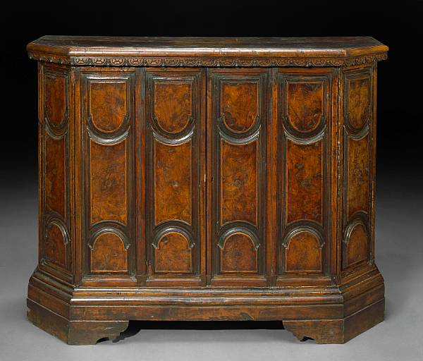 Appraisal: An Italian Baroque style walnut credenza incorporating antique and later