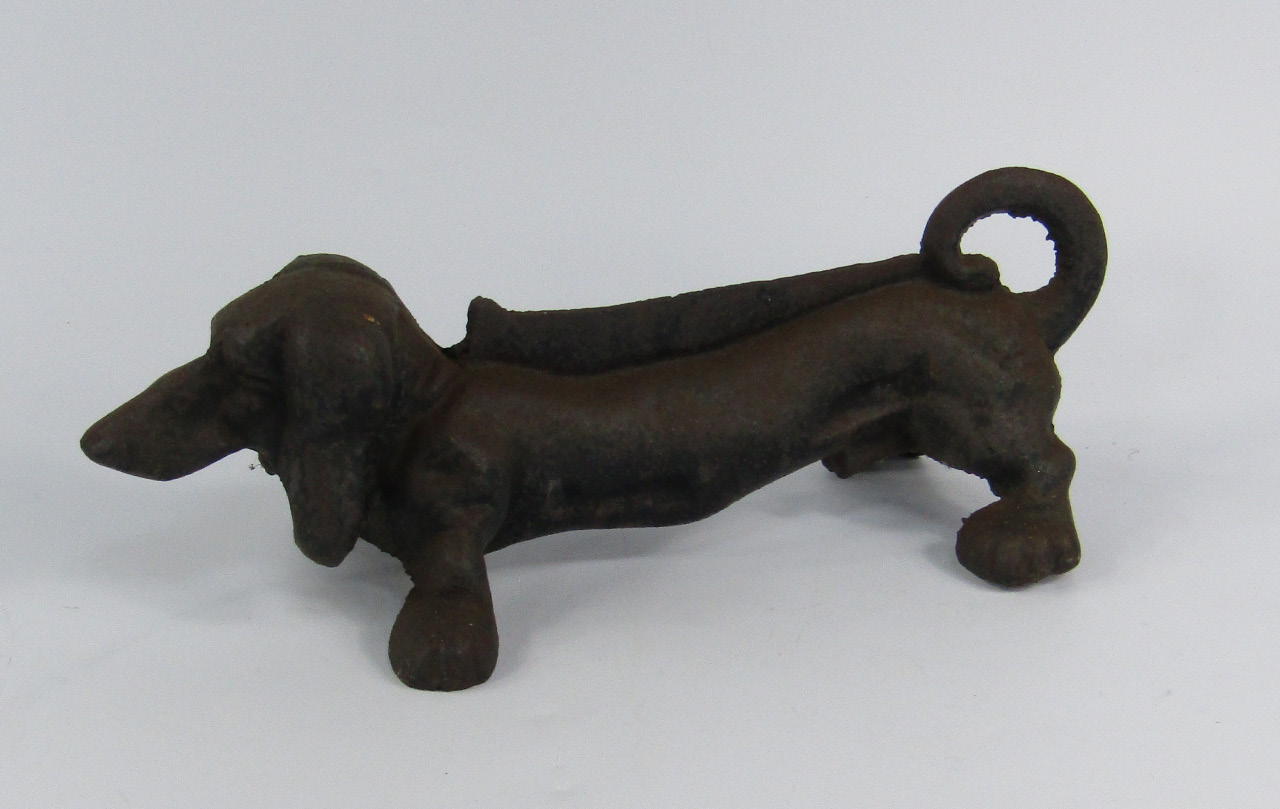 Appraisal: A cast iron boot scraper modelled as a Dachshund cm