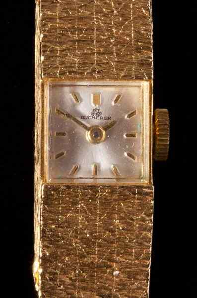 Appraisal: Lady's Gold Wristwatch Pin Carl Bucherercirca s the watch in