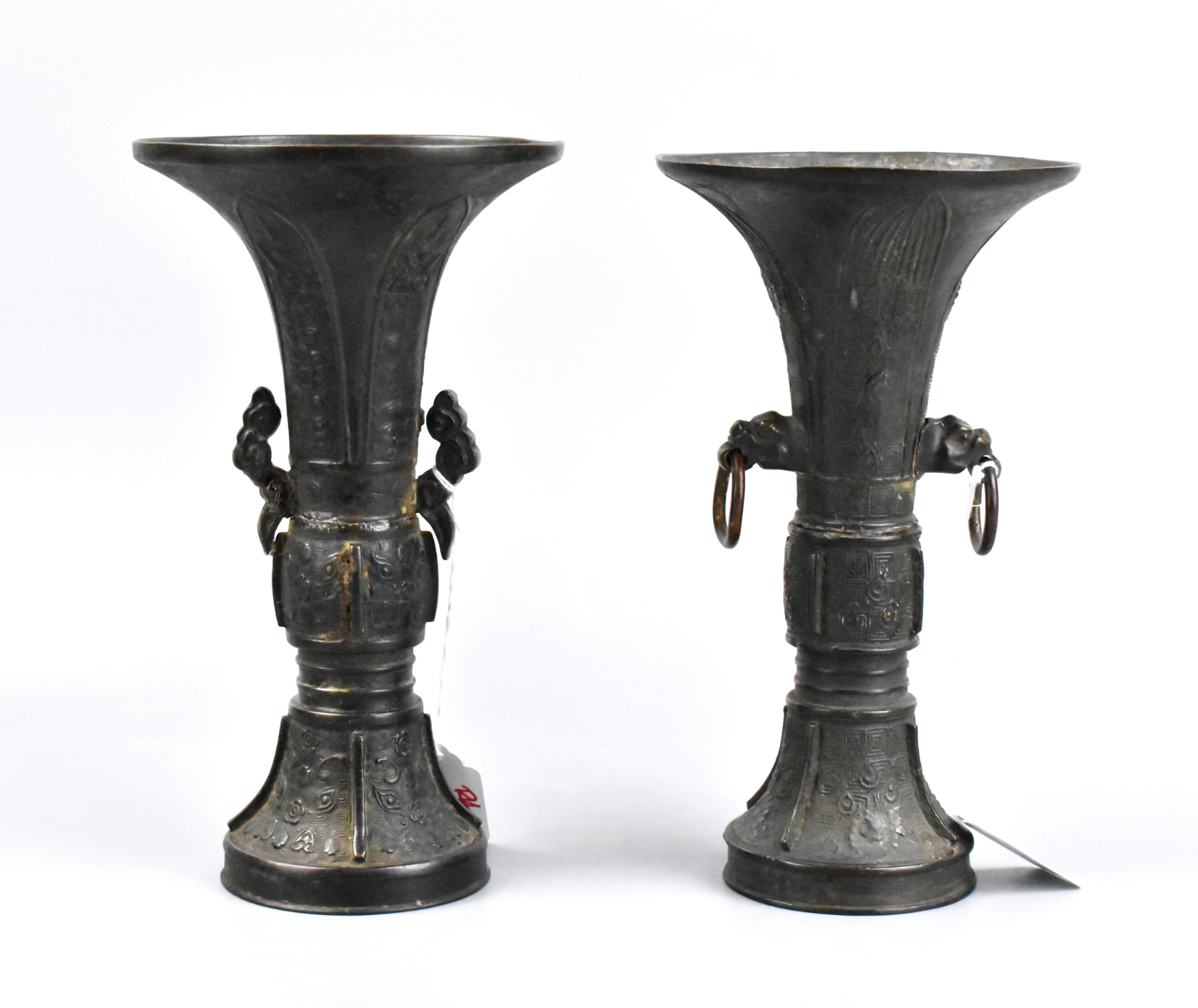 Appraisal: A pair of Chinese bronze Gu vases dating from the