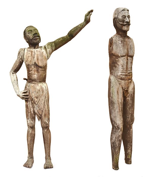 Appraisal: PAIR OF SRI LANKAN CARVED TIMBER STRONG MAN FIGURES LARGEST