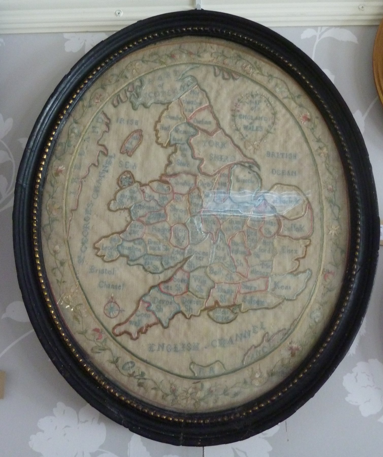 Appraisal: An oval needlework map of England and Wales by Elizabeth