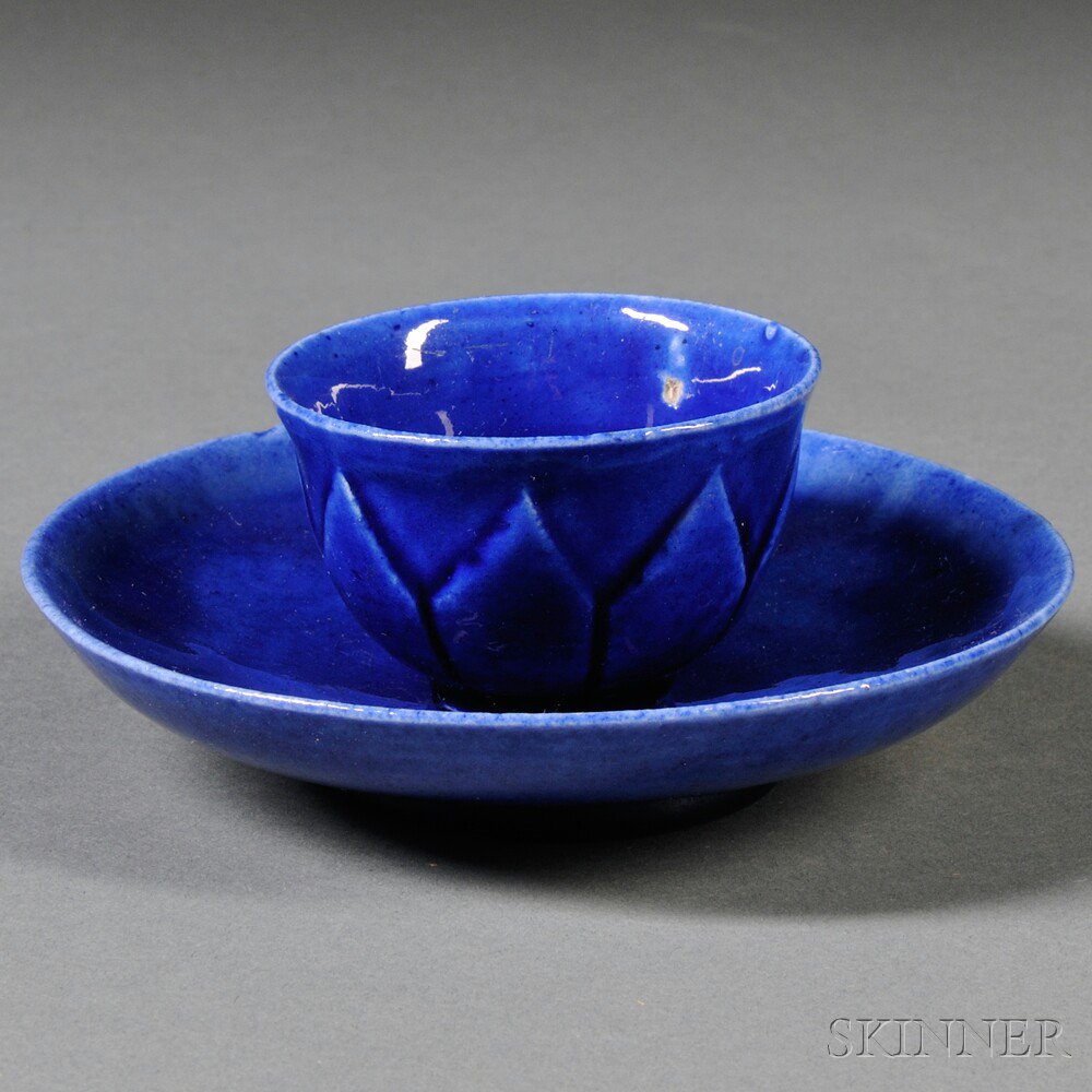 Appraisal: Blue Glazed Earthenware Tea Bowl and Saucer England or Continental