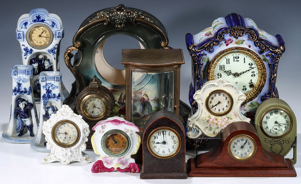 Appraisal: A LARGE LOT OF SMALL CLOCKS AND CLOCK CASES The