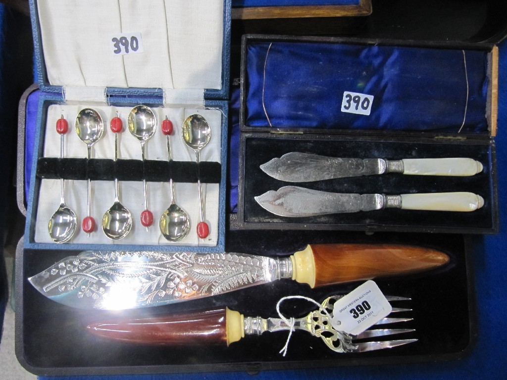 Appraisal: Lot comprising cased carving set pair butter knives coffee bean