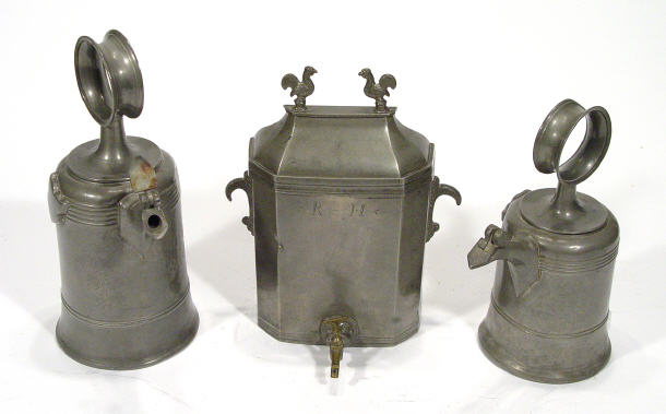 Appraisal: Three pewter decanters one rectangular shaped with tap and cockerel