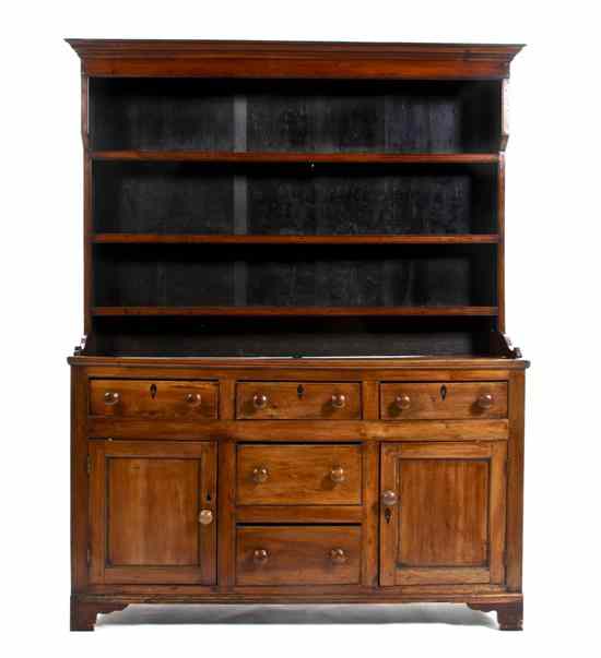 Appraisal: A Pine Welsh Cupboard in two parts the superstructure with