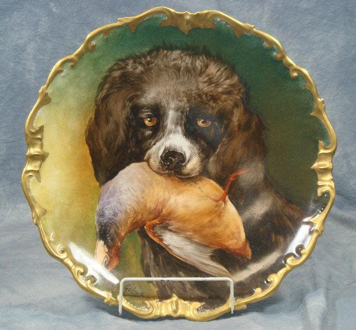 Appraisal: Imperial Limoges porcelain charger hunting dog with game bird in