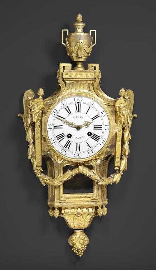 Appraisal: CARTEL CLOCK AUX TETES DE BELIERS Louis XVI the dial