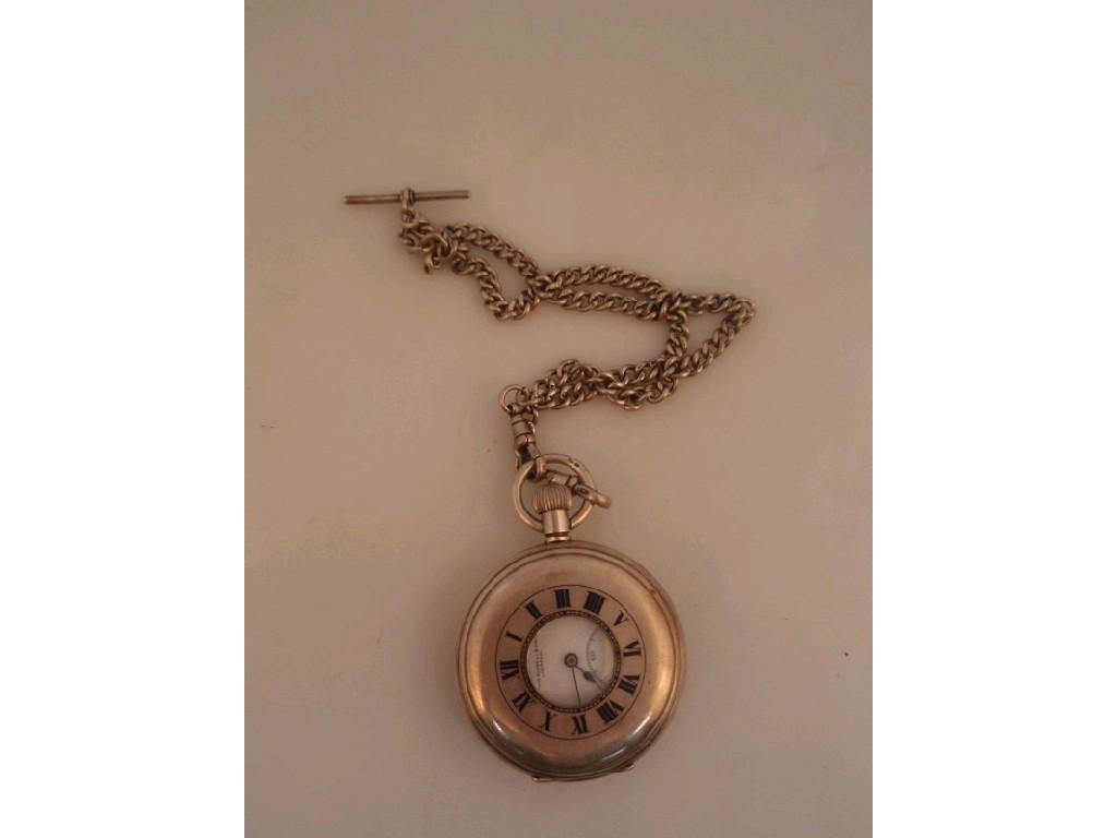 Appraisal: A silver half hunter pocket watch bezel wind and Albert