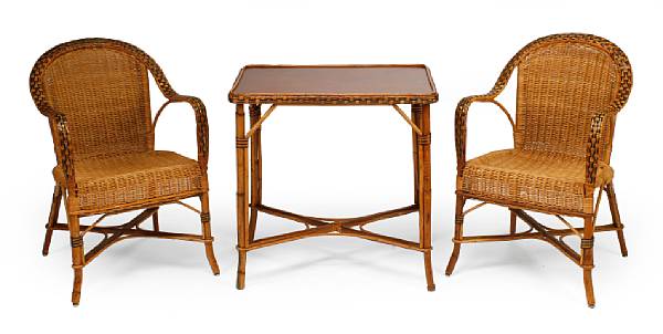 Appraisal: A three piece wicker and rattan set comprising a table