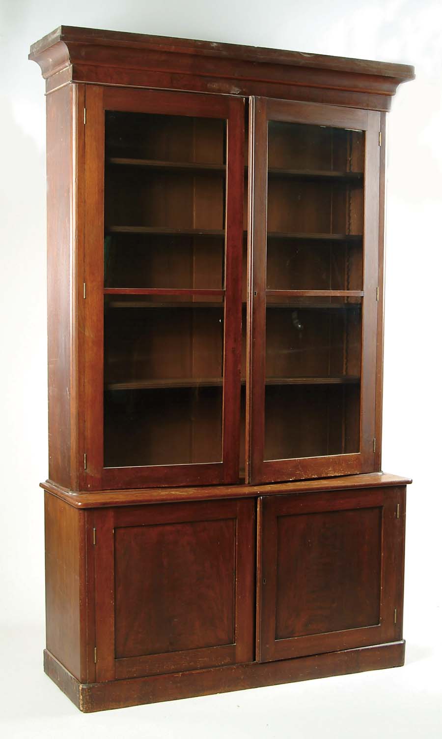 Appraisal: TWO PART VICTORIAN STEP BACK WALNUT BOOKCASE Bottom section with