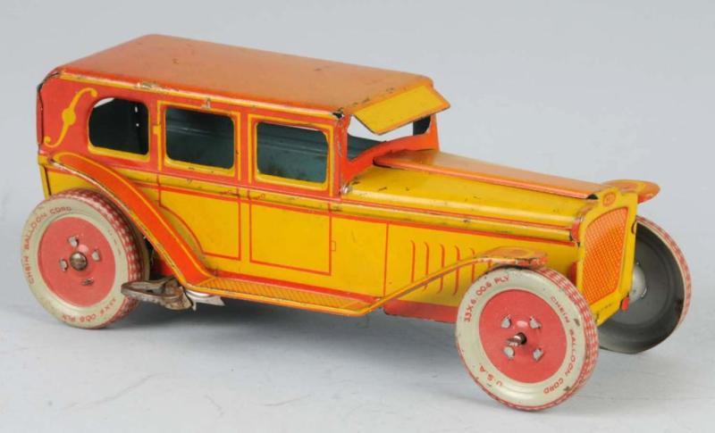 Appraisal: Tin Chein Automobile Wind-Up Toy Description American Working Nice lithography