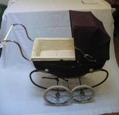 Appraisal: A Marmet doll's perambulator coach built with canvas hood padded