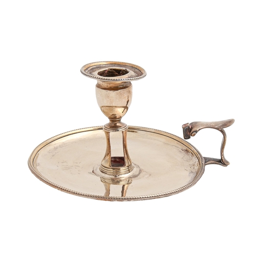 Appraisal: A George III silver chamberstick with vase shaped sconce and