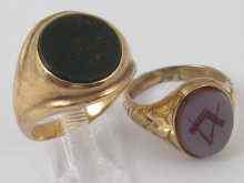 Appraisal: A ct gold Masonic signet ring together with a yellow