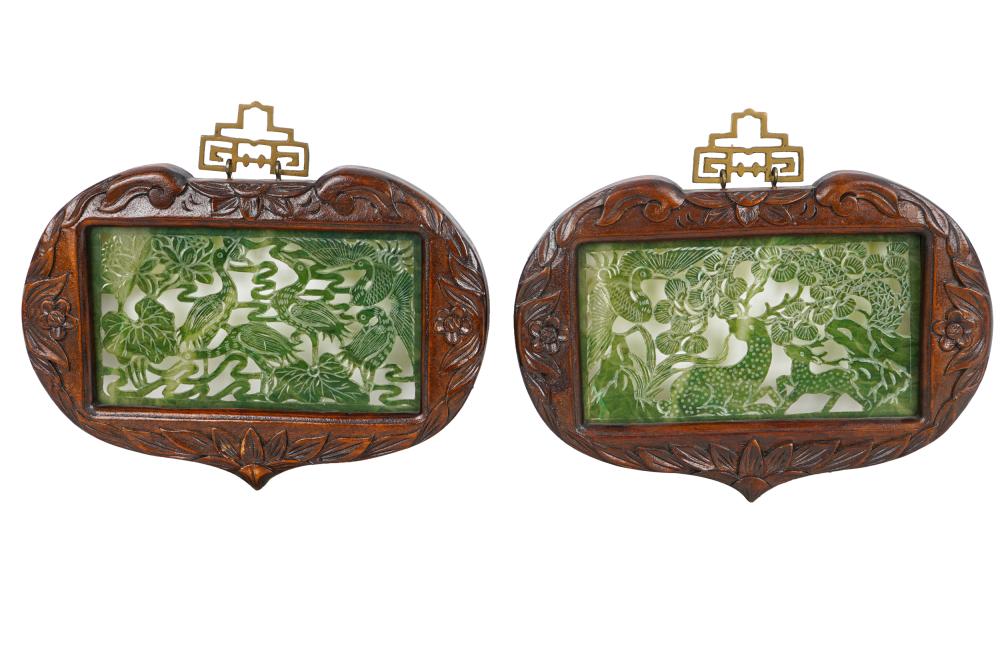 Appraisal: SET OF FOUR CHINESE JADE PLAQUESeach within a carved wood