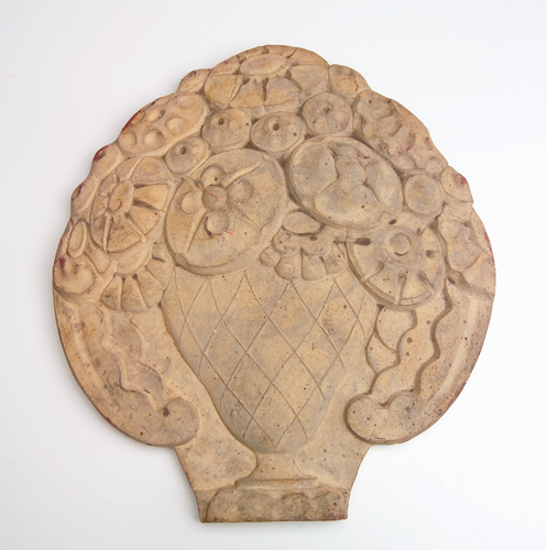 Appraisal: GRUEBY Unglazed plaque embossed with an urn overflowing with stylized