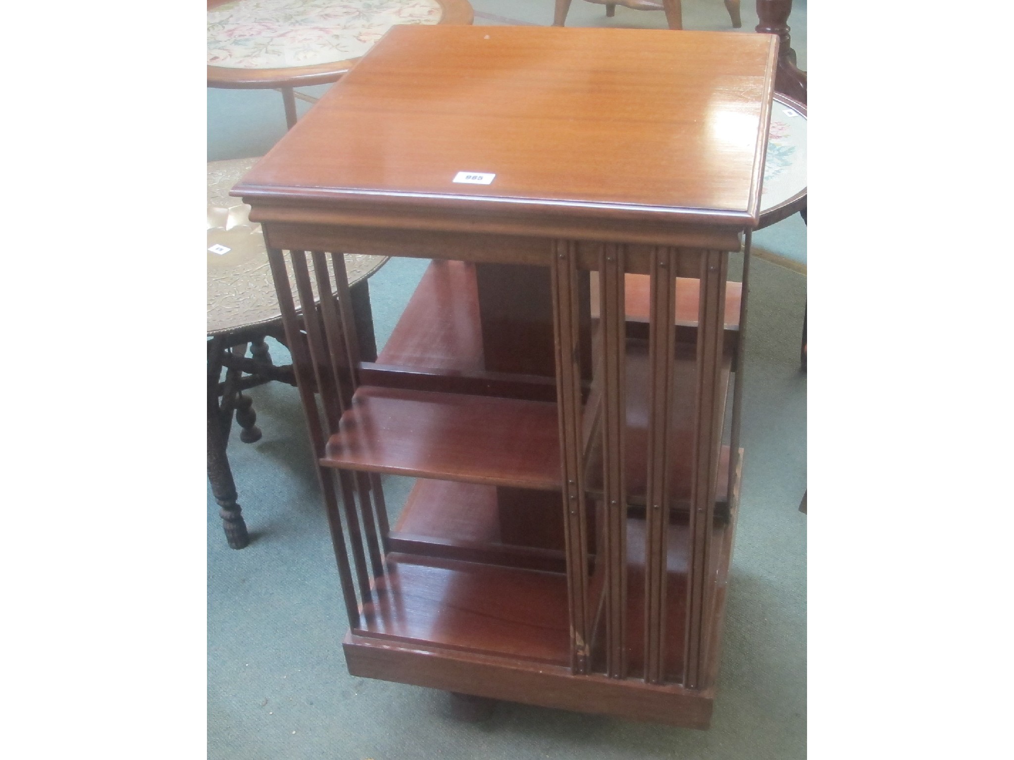 Appraisal: A mahogany revolving bookcase