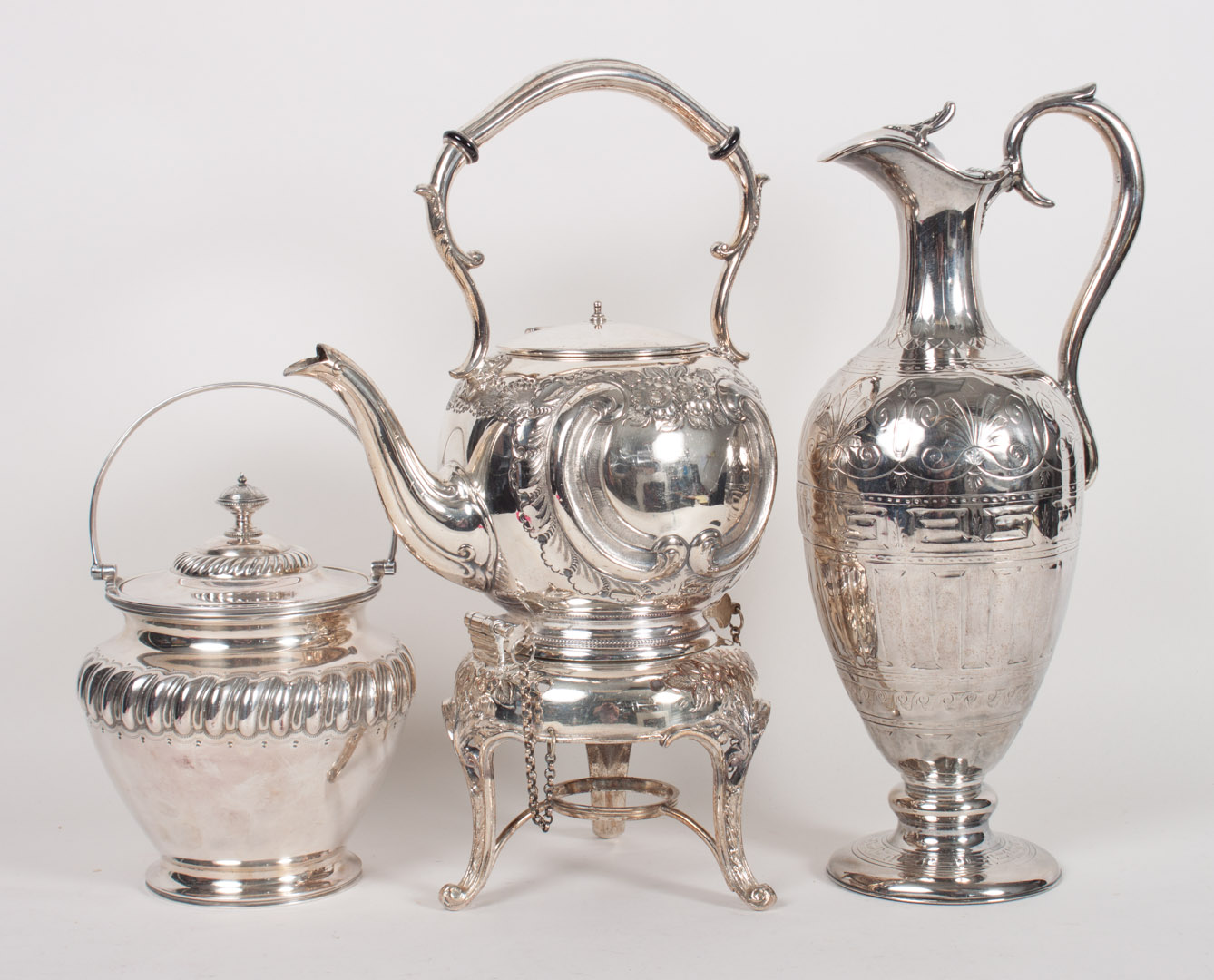 Appraisal: Three pieces of Victorian silver-platedware comprising a neoclassical style wine