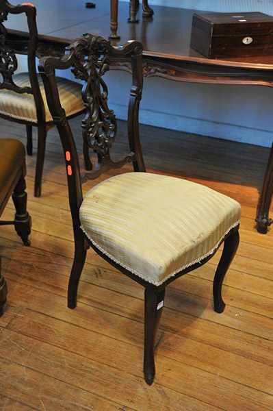 Appraisal: THREE EDWARDIAN DINING CHAIRS WITH FRETWORK BACKS