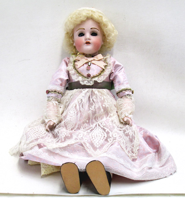 Appraisal: GERMAN BISQUE HEAD DOLL Kestner attributed having blond wig fur