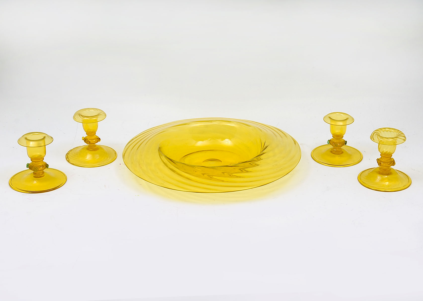 Appraisal: PIECE STEUBEN VASELINE GLASS COLECTION Comprising - Vaseline glass candlesticks