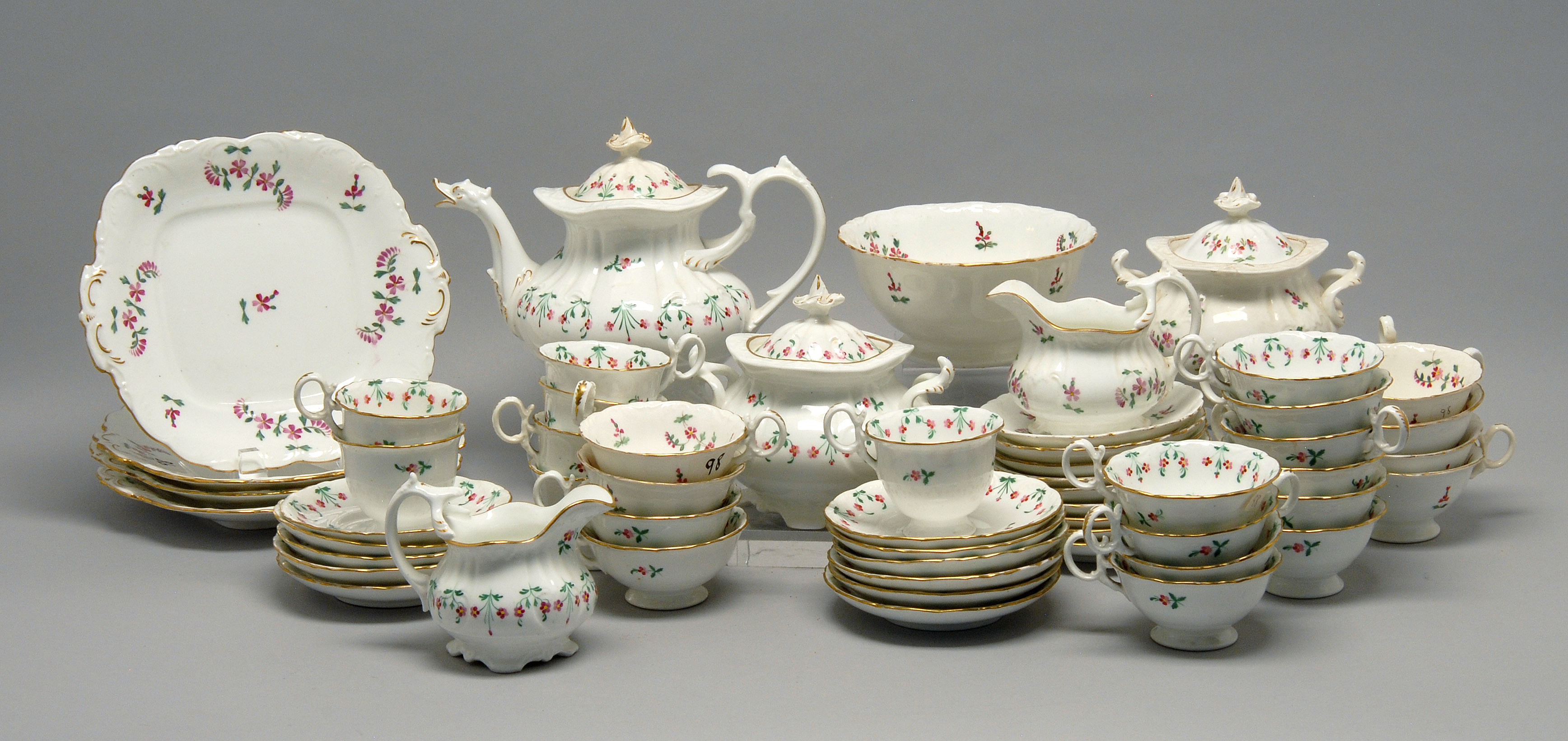 Appraisal: TWO ENGLISH PORCELAIN PARTIAL TEA SERVICES Both decorated with green