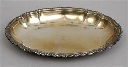 Appraisal: GEORGE III ARMORIAL SILVER SHALLOW VEGETABLE DISH John Wakelin and