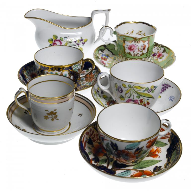 Appraisal: FIVE TEA AND COFFEE CUPS AND SAUCERS AND A CREAM