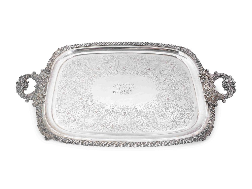 Appraisal: An English Silverplated Two-Handled Footed Tray Length over handles x