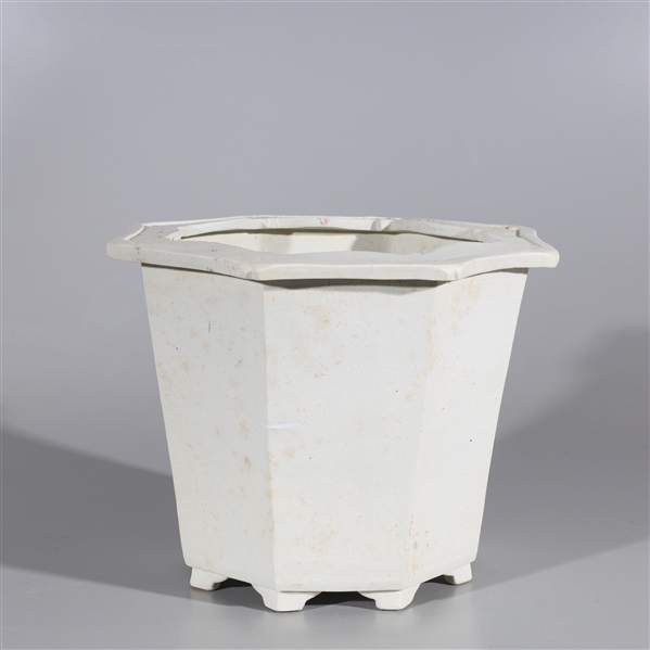 Appraisal: Chinese white unglazed octagonal ceramic planter with hole drilled to