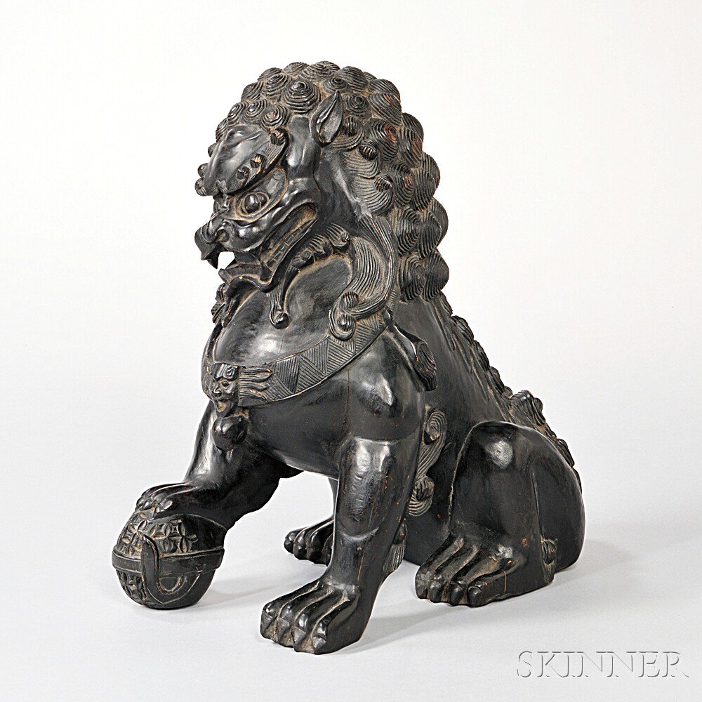 Appraisal: Carved and Stained Wood Shishi th century the guardian lion