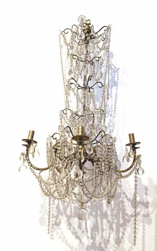 Appraisal: Georgian style brass and crystal five-arm chandelier with teardrop and