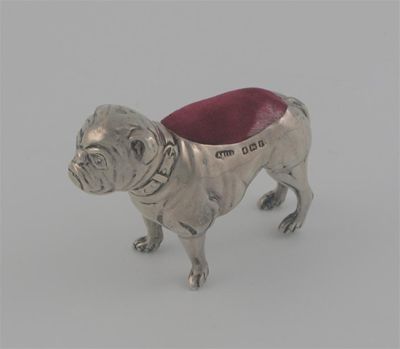 Appraisal: A standing bulldog wearing a collar by Adie Lovekin Birmingham