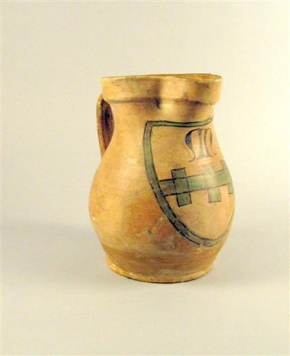 Appraisal: French earthernware jug th century Having a pinched spout and