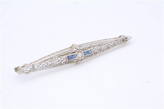 Appraisal: DIAMOND BAR PIN Center diamond is accented by four French-cut